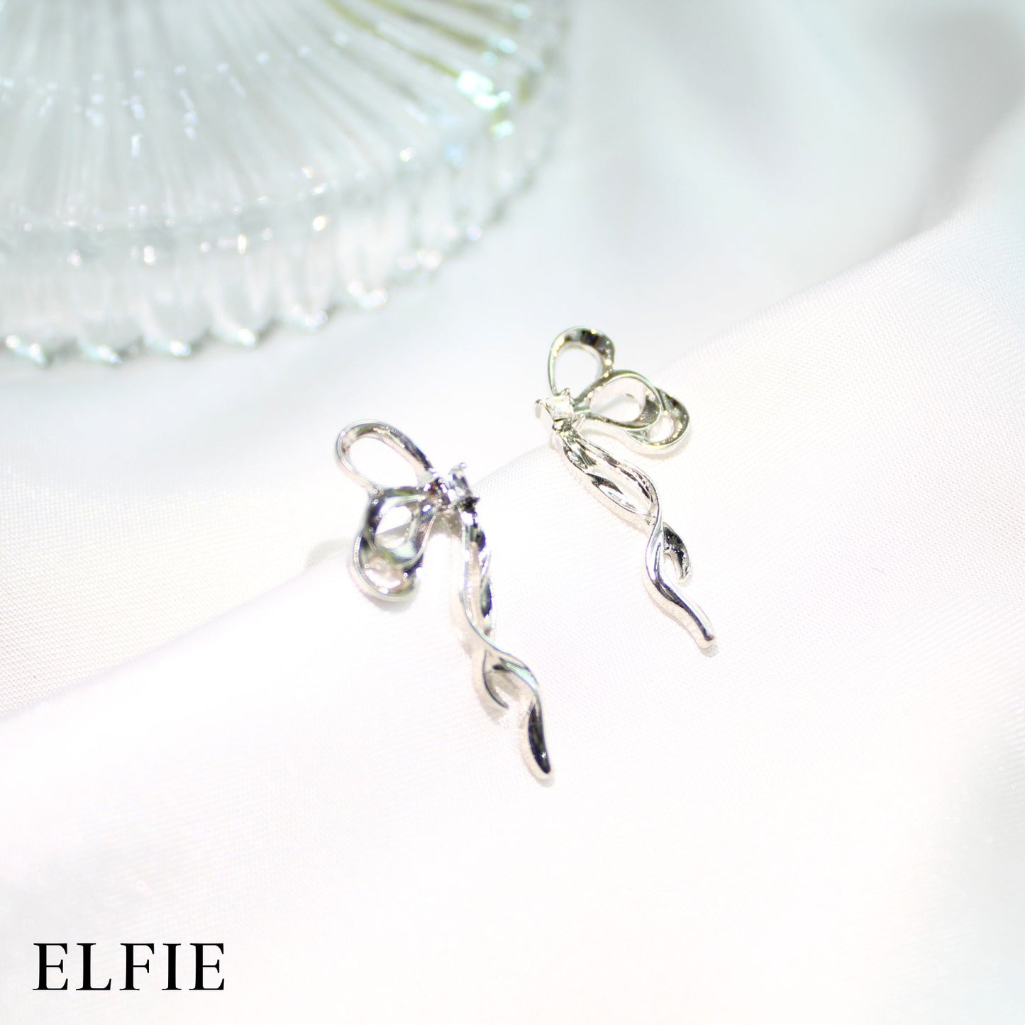 Glossy Silver Ribbon Stud Earring