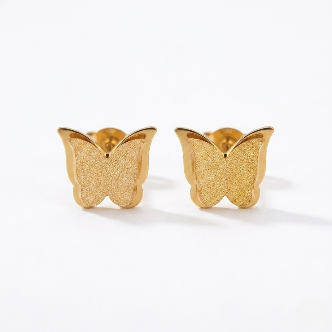Pendiente de titanio plateado con forma de mariposa brillante