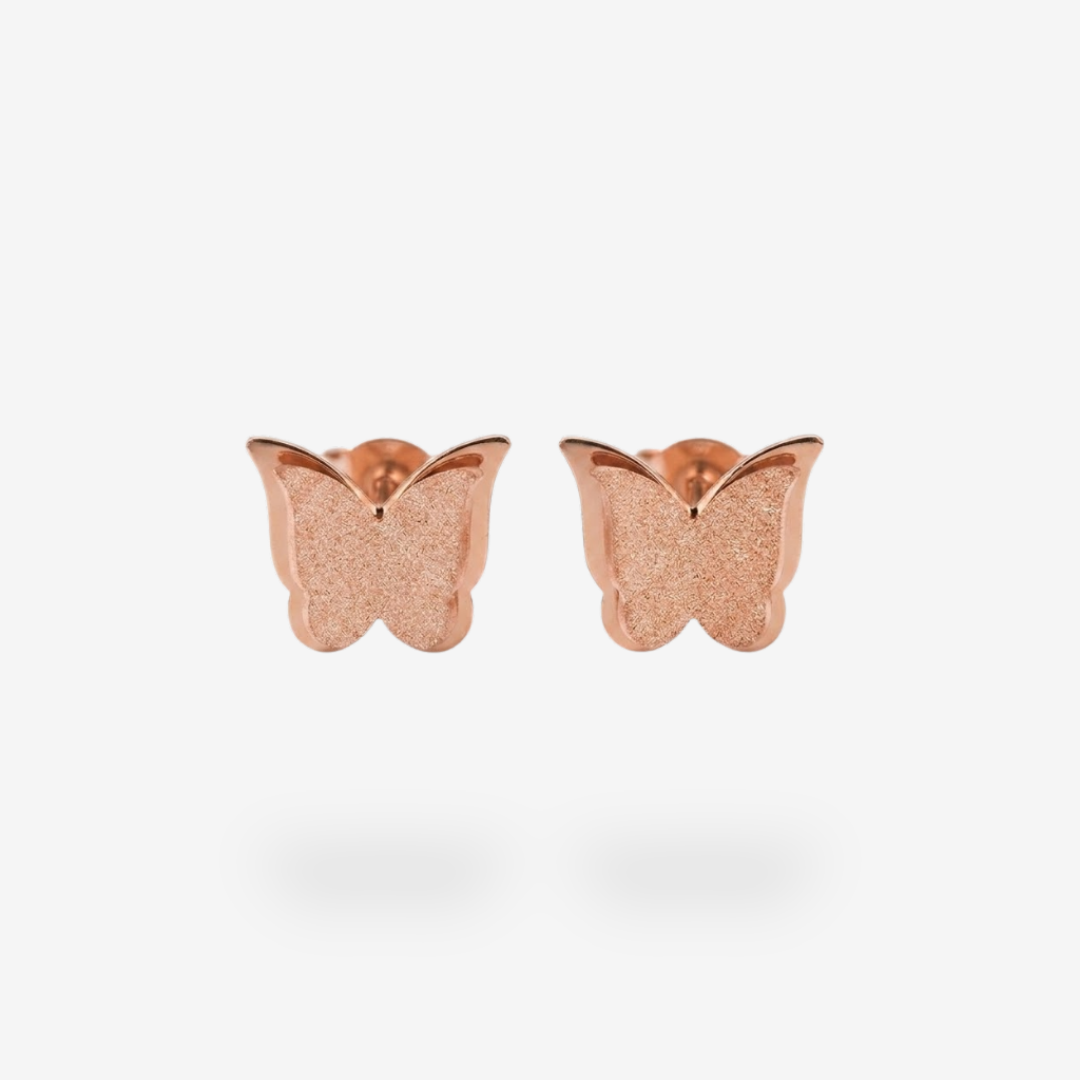 Pendiente de titanio plateado con forma de mariposa brillante