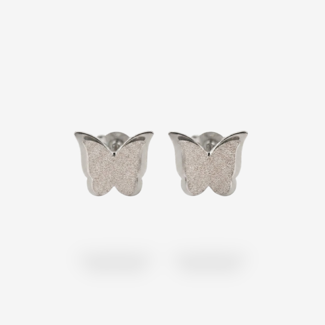 Pendiente de titanio plateado con forma de mariposa brillante